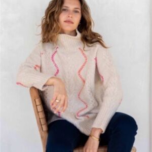 Mersea Alpine Cable Turtleneck Sweater with Pink and Orange Stitch Detail